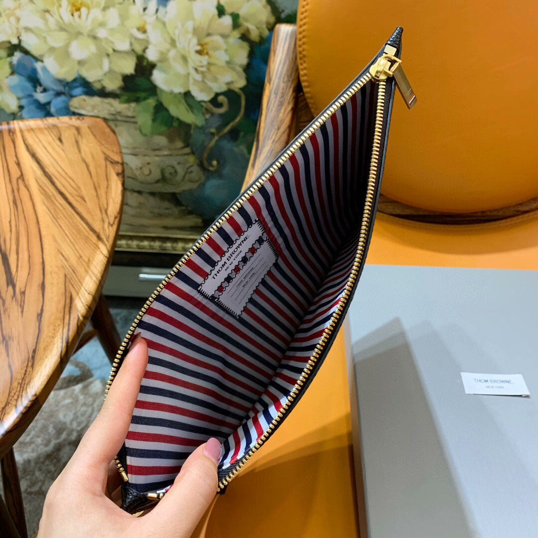 Three-color woven clutch bag THOM TREND