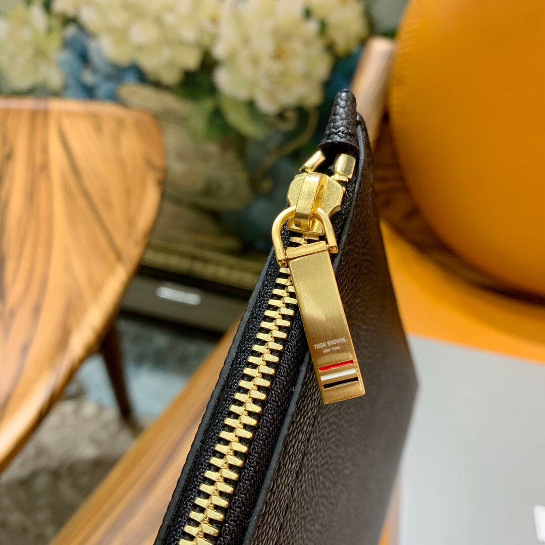 Three-color woven clutch bag THOM TREND